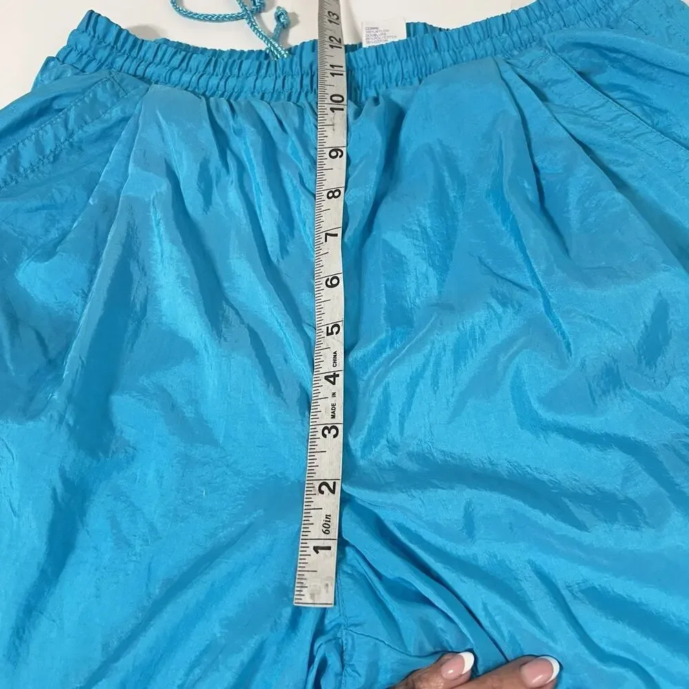 Vintage Nike Women’s Teal Nylon Windbreaker Track Pants Size L Lined 90’s